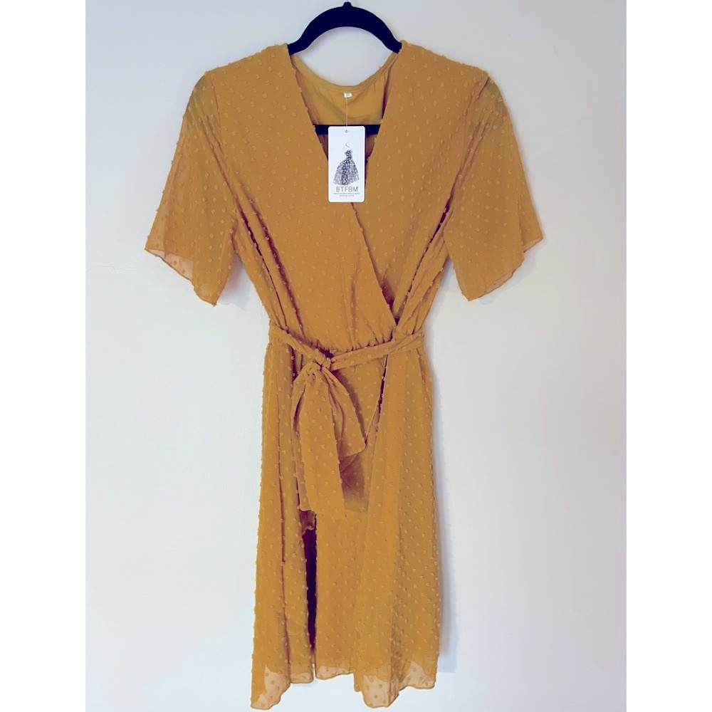 Mustard casual wrap with Swiss dots.